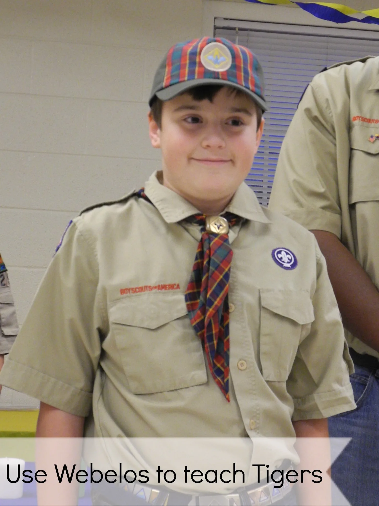 cub scout using webelos to teach tigers