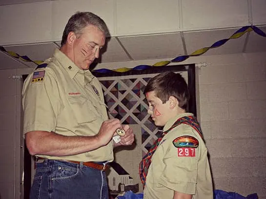 Awarding a Cub Scout rank badge