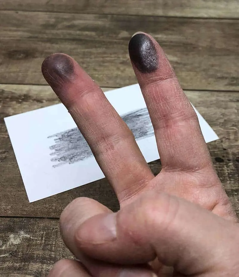 pencil graphite on fingers for fingerprint activity