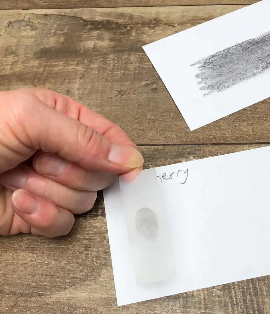 tape with fingerprint on index card