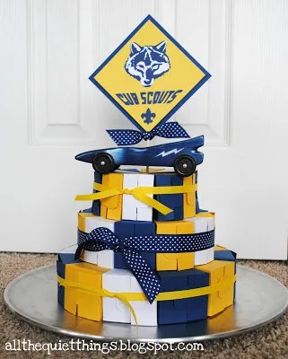 blue and gold box cake all the quiet things