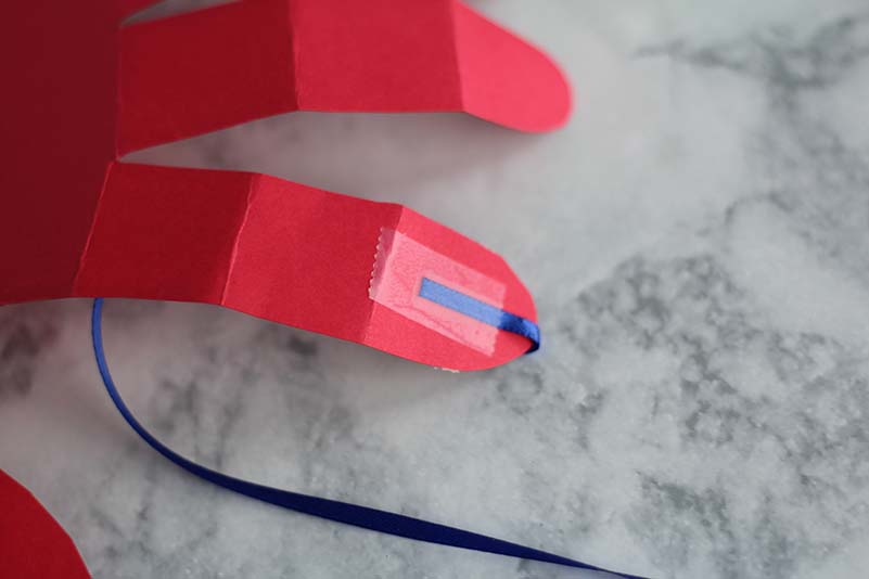 robot hand tape ribbon