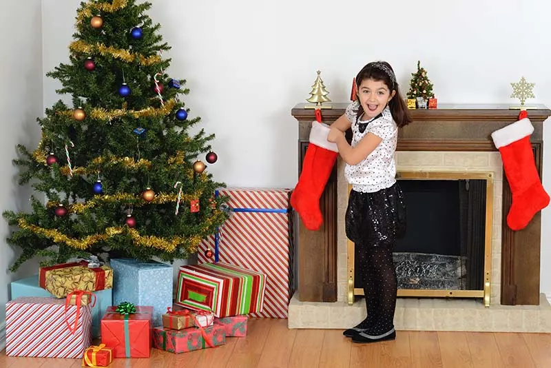 girl with christmas stocking